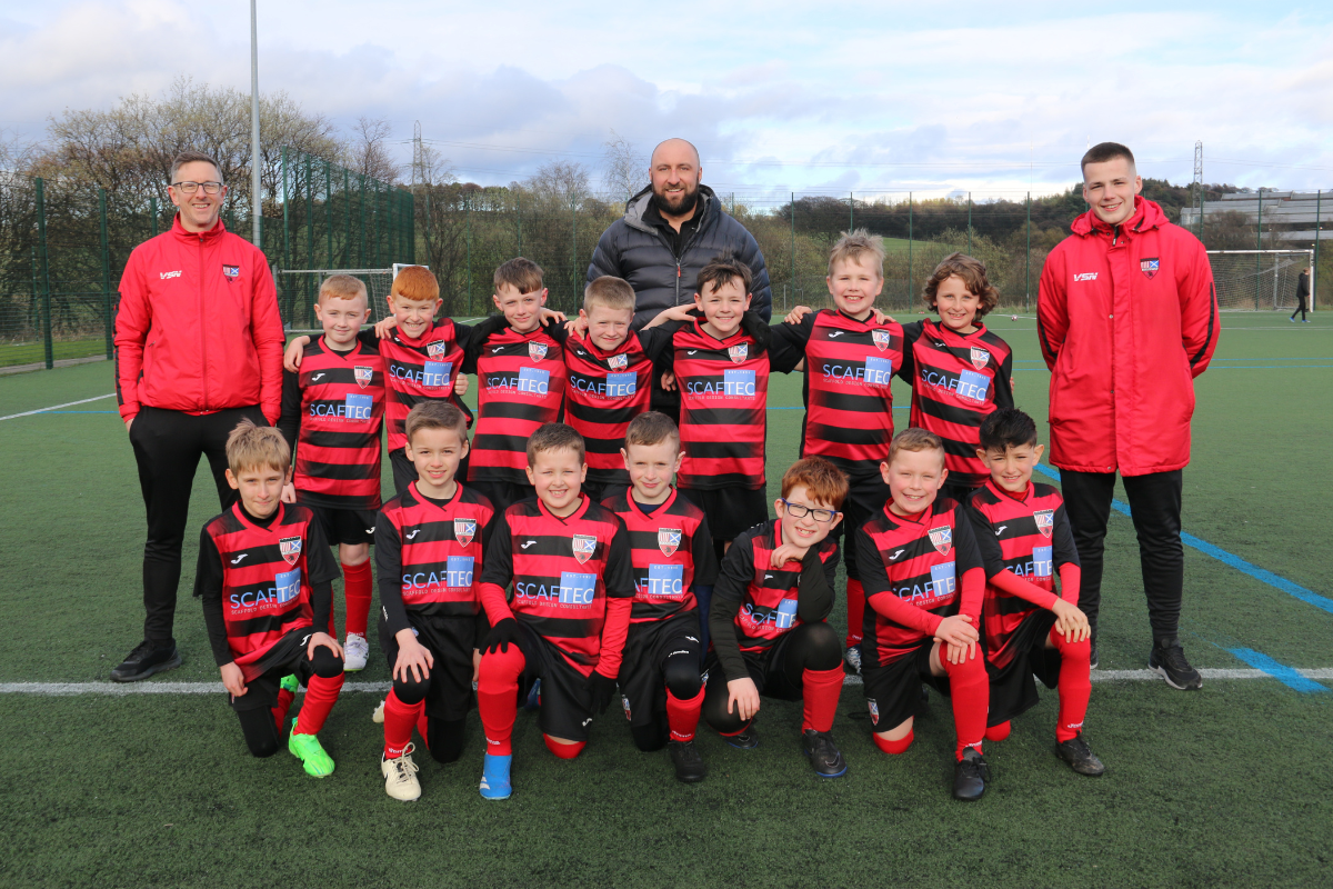 Team Photo with our new strips